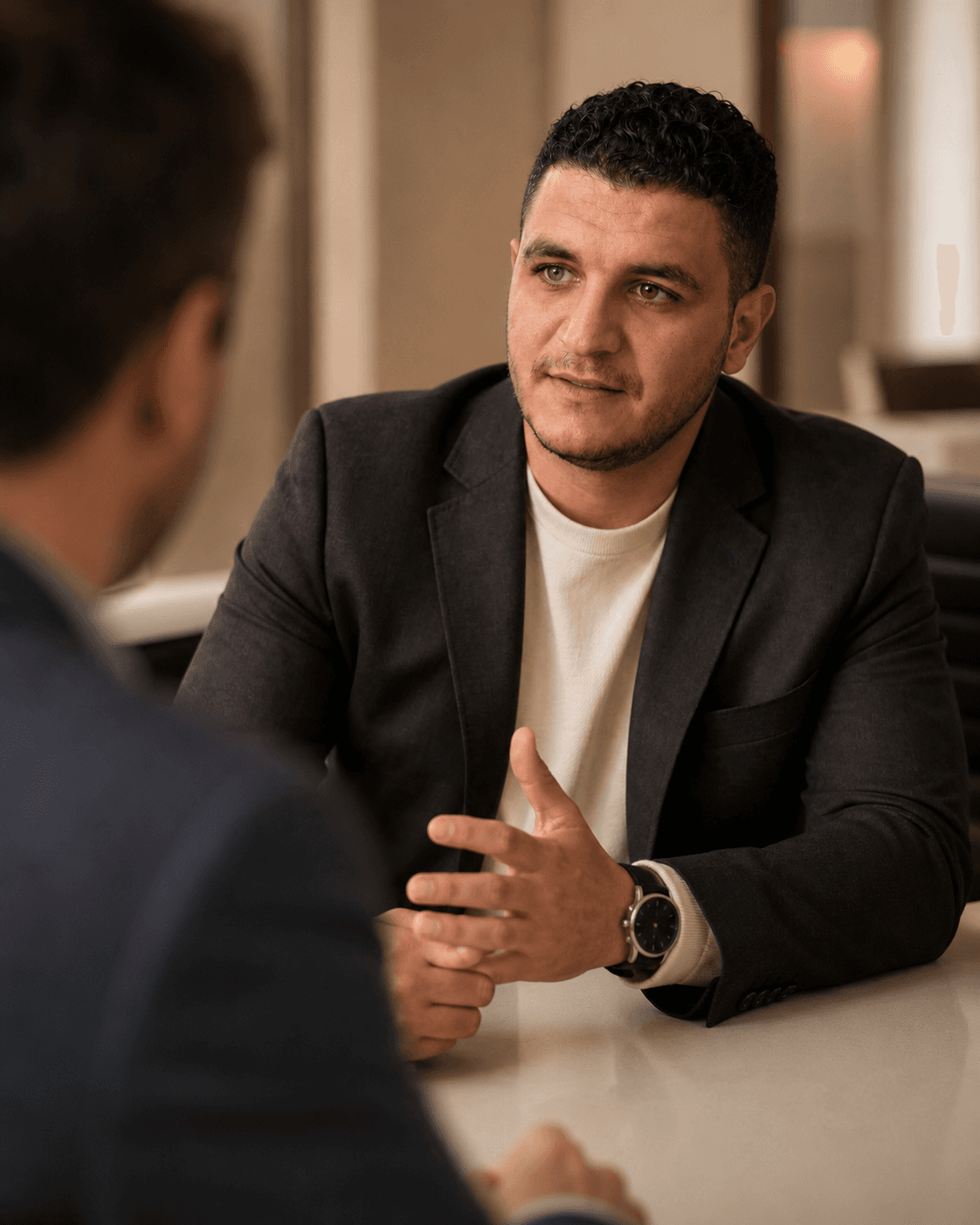Ahmed Awad in a focused workshop conversation